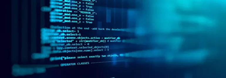 Close-up view of computer code on a blue screen.